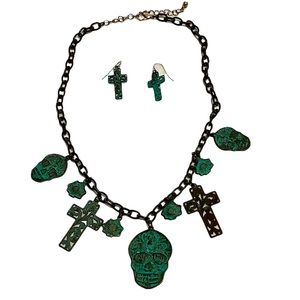 Sugar skull, cross, and flower necklace with matching cross earrings